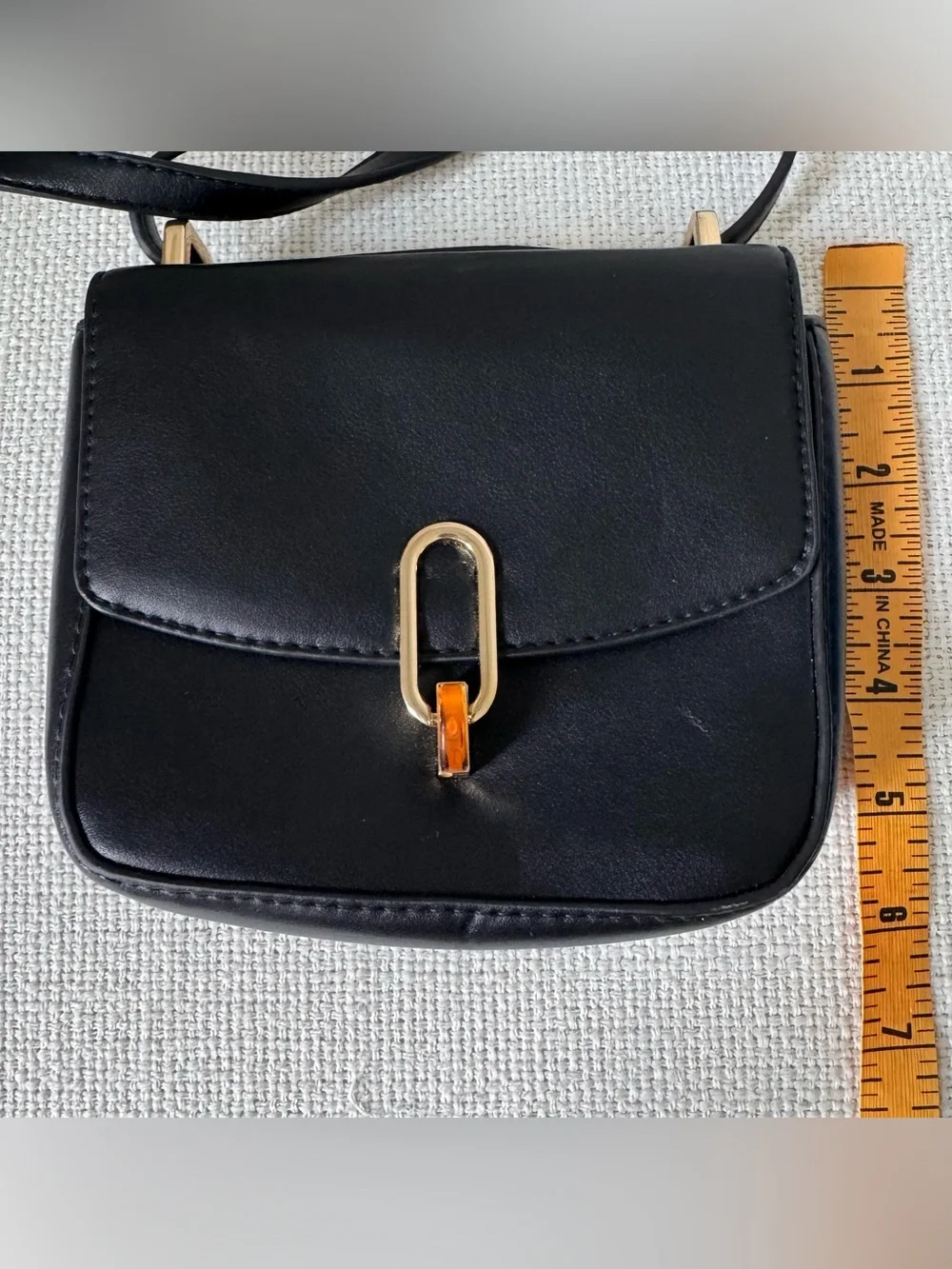 Target Classic Black Mini Crossbody Bag with Gold Hardware and Amber Accent